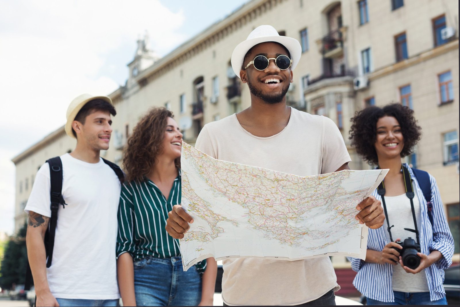 Friends On Vacation Together Using a Map